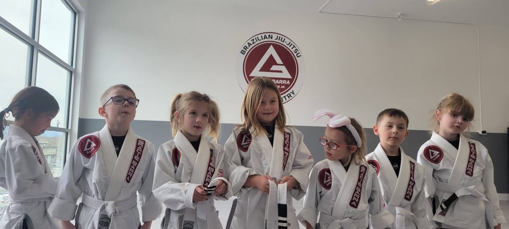 Gracie Barra Lake Country kids standing inline.